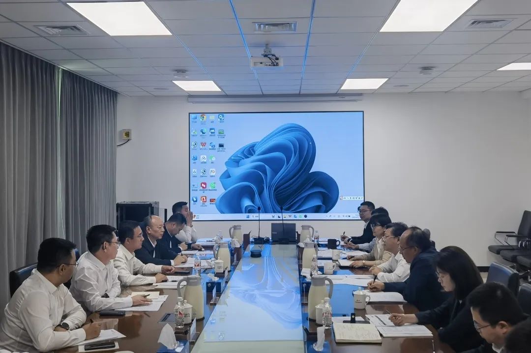 公司主要領導會見中國農墾集團黨委書記、董事長張磊